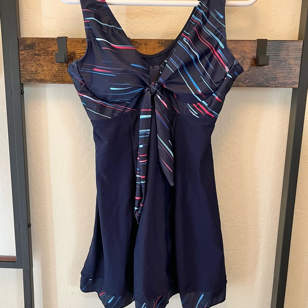 NWT. Womens swim dress with shorts.